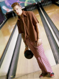 Young Man Standing at a Bowling Alley Photographic Print