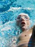 High Angle View of a Young Man Swimming the Backstroke Photographic Print