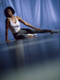 Young Woman Doing Yoga on the Floor Photographic Print
