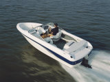 Two People in a Motorboat Photographic Print
