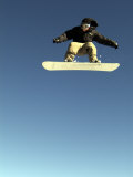 Airborne Snowboarder Lámina fotográfica