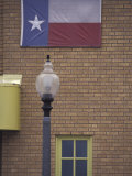 Texas Flag and Street Light, Lubbock, Texas, USA Photographic Print by Darrell Gulin