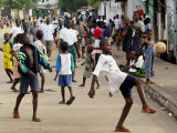 Children Play Soccer on a Monrovian Street Photographic Print