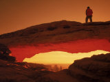 Hiker on Mesa Arch, Canyonlands National Park, UT Photographic Print by Cheyenne Rouse