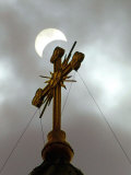 The Moon Partially Covers the Sun During a Partial Solar Eclipse Photographic Print