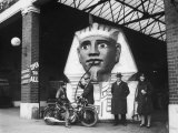 Curious Sphinx Petrol Pump at a London Garage During World War Two Photographie par Fred Musto