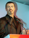 George Michael Collects His Award at the Help a London Child Auction Photographie