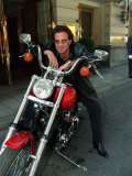 Tico Torres Drummer of Bon Jovi and Boyfriend of Supermodel Eva Herzagova Sits with His Motorbike Photographie