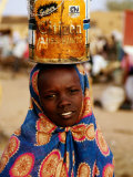 Girl in Colourful Wrap Balancing Paint Tin on Head, Agadez, Niger Photographic Print by Pershouse Craig