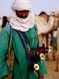 Tuareg Sword Salesman at Camel Market, Agadez, Niger Photographic Print by Pershouse Craig