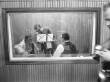 Spike Milligan, Harry Seacombe and Peter Sellers Rehersing for the Goons Radio Show, March 1963 Stampa fotografica
