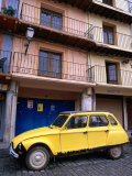 Yellow Citroen Parked Outside Apartments, Calatayud, Spain Photographic Print by John Banagan