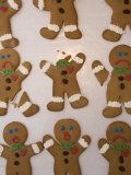 A Sheet of Gingerbread Men with Different Facial Expressions Photographic Print by Joel Sartore