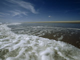 Atlantic Ocean Surf Washes the Sand Beneath a Blue Sky, Assateague Island, Virginia Photographic Print by James P. Blair