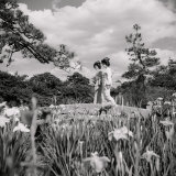 Two Geishas Cross a Small Bridge in the Iris Garden at the Doors to Tokyo Photographic Print