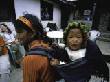 Small Baby on the Back of Young Girl, Nepal Posters par David D'angelo