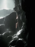 Lowering Kayak into a Wet Cave, Mexico Prints by Michael Brown