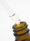 Pipette with Ear Drop Medicine Photographic Print by Geoff Kidd