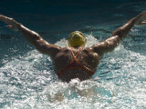 Young Woman Swimming the Butterfly Stroke in a Swimming Pool, Bainbridge Island, Washington, USA Photographic Print
