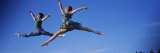 Two Ballet Dancers in Mid-air, Washington State, USA Lámina fotográfica por Panoramic Images