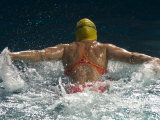 Young Woman Swimming the Butterfly Stroke in a Swimming Pool, Bainbridge Island, Washington, USA Photographic Print