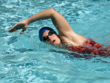 Young Woman Swimming the Freestyle Stroke in a Swimming Pool, Bainbridge Island, Washington, USA Photographic Print