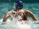 Young Woman Swimming the Butterfly Stroke in a Swimming Pool, Bainbridge Island, Washington, USA Photographic Print