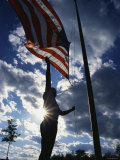 Park Ranger Raising Flag Photographic Print