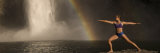 Young Woman Practicing Yoga on a Rock, Snoqualmie Falls, Washington State, USA Fotografie-Druck von Panoramic Images 