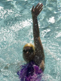 Young Woman Swimming the Backstroke in a Swimming Pool, Bainbridge Island, Washington, USA Photographic Print