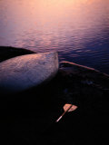 Overturned Kayak and Paddle Seen at Twilight Photographic Print