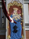 Latvia, Riga, Virgin Mary and Jesus Christ on Hanseatic Building Photographic Print