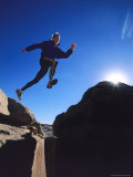 Running on a Sandstone Ridge Above Bluff, Utah Photographic Print by Bill Hatcher