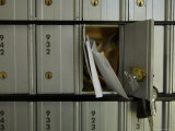 Letters and Bills are Sticking Out of a Post Office Box Photographic Print