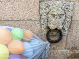 Balloons Tied up to Handle on Wall, St. Petersburg, Russia Photographic Print