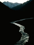 Glistening in the Light, the Obhingo River Flows Down Through the Mountain Vall Eys of Tajikistan Photographic Print