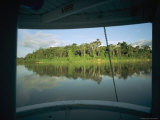 The stern of a riverboat provides a panoramic view of the shoreline Lámina fotográfica