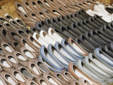 Pairs of Shoes at a Korean Market Resemble Dug-Out Canoes Photographic Print by Maynard Owen Williams