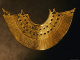 A gold earring from Colombia's Sinu culture, Photographic Print