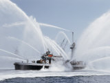 A Fireboat Sprays Jets of Water Photographic Print by J. Baylor Roberts