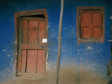 Faded Blue and Red Paint Cover the Entrance to a Dwelling in Addis Ababa Photographic Print
