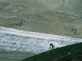 Bikers Travel Across the Rough Terrain and Melt Ice of Southern Alaska Photographic Print by Roman Dial