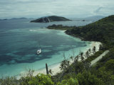 A Boat Anchored Along the Beaches of Virgin Gorda Photographic Print by Todd Gipstein