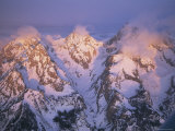 Clouds Rise from the Peaks of Three Mountains in the Teton Range Fotografisk tryk af Paul Chesley Clouds Rise from the Peaks of Three Mountains in the Teton Range Fotografisk tryk af Paul Chesley