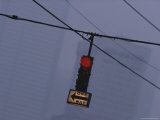 A Stoplight Dangles from a Cable on a Foggy Downtown Seattle Day Photographie