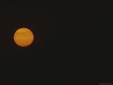 A Golden Harvest Moon Rises over La Paz, Mexico Photographie
