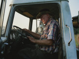 A Man Driving a Truck Photographic Print by Medford Taylor