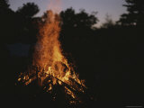 A Pile of Brush Burns Brightly in the Deepening Dusk Photographic Print by Roy Gumpel