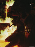 A Man in Protective Gear Tends a Smelter at Magma Metals Company Photographic Print by Joel Sartore