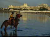 A Boy on Horseback Rides Along Jeddahs Waterfront Photographic Print